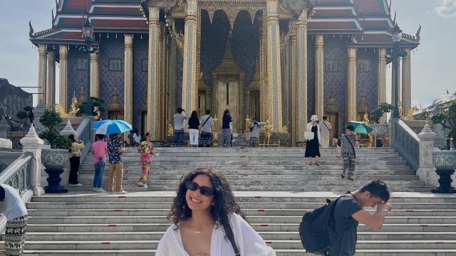 Girl in front of The Grand Palace in Bangkok,Thailand