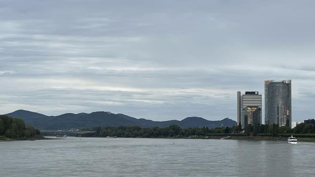 Photo of the Rhine river, with the Bonn city scape