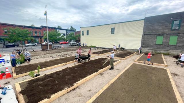 Noah Donnellan-Doser is the midst of a story on the Canton demonstration garden.