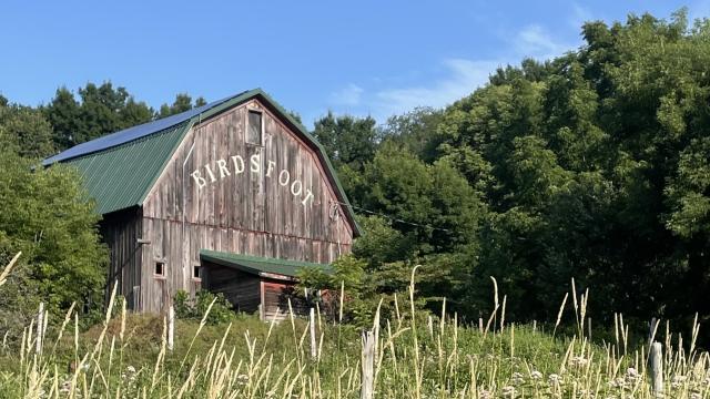 The view of the Birdsfoot barn from the road