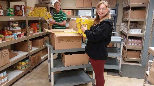 Brianna and Arthur Working in the Pantry