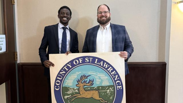 Photo with County Sign