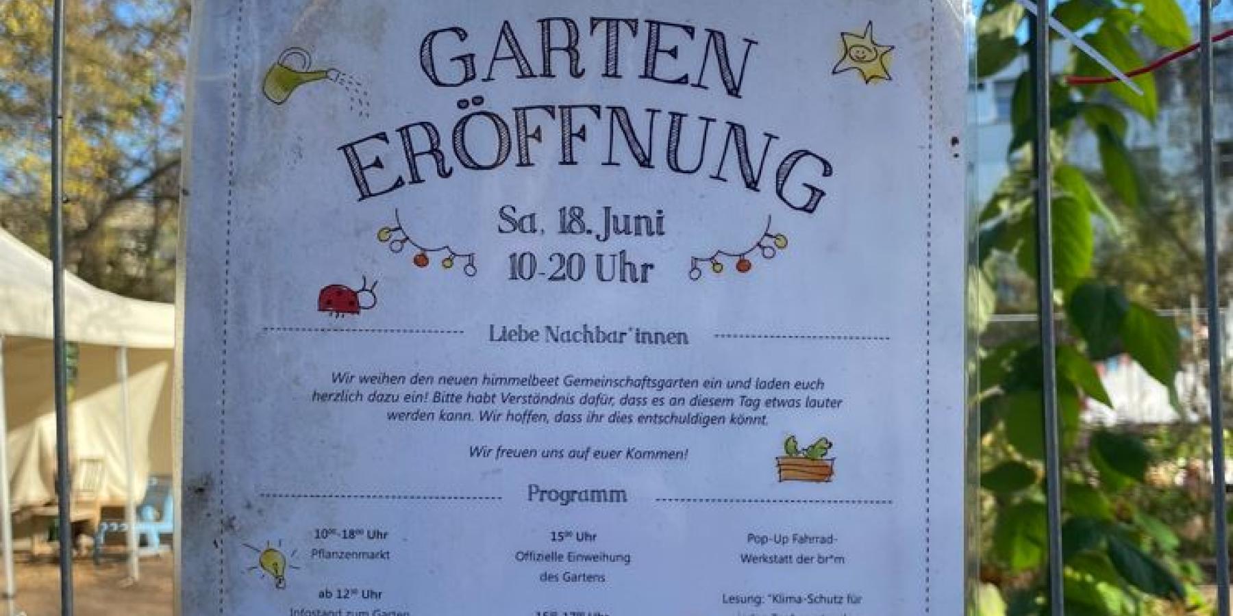 A sign in German at the gate to a garden; a white sheet of paper stating times and details of the garden&#039;s opening hours.