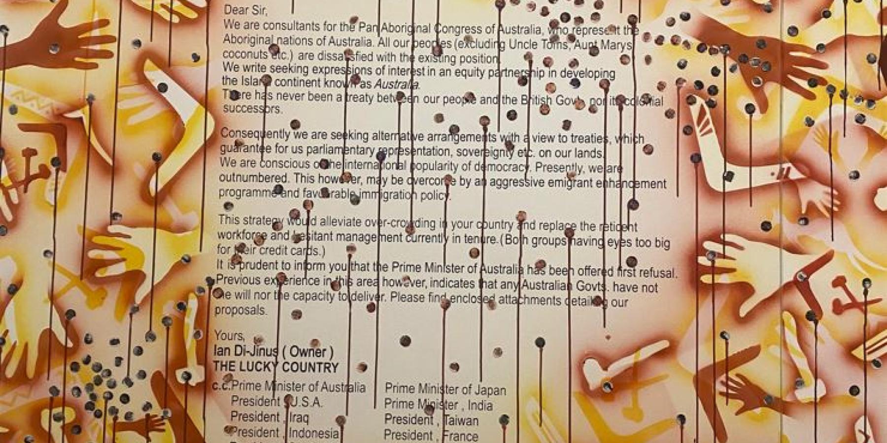 A sign with text and surrounded by artwork showing hands and boomerangs.