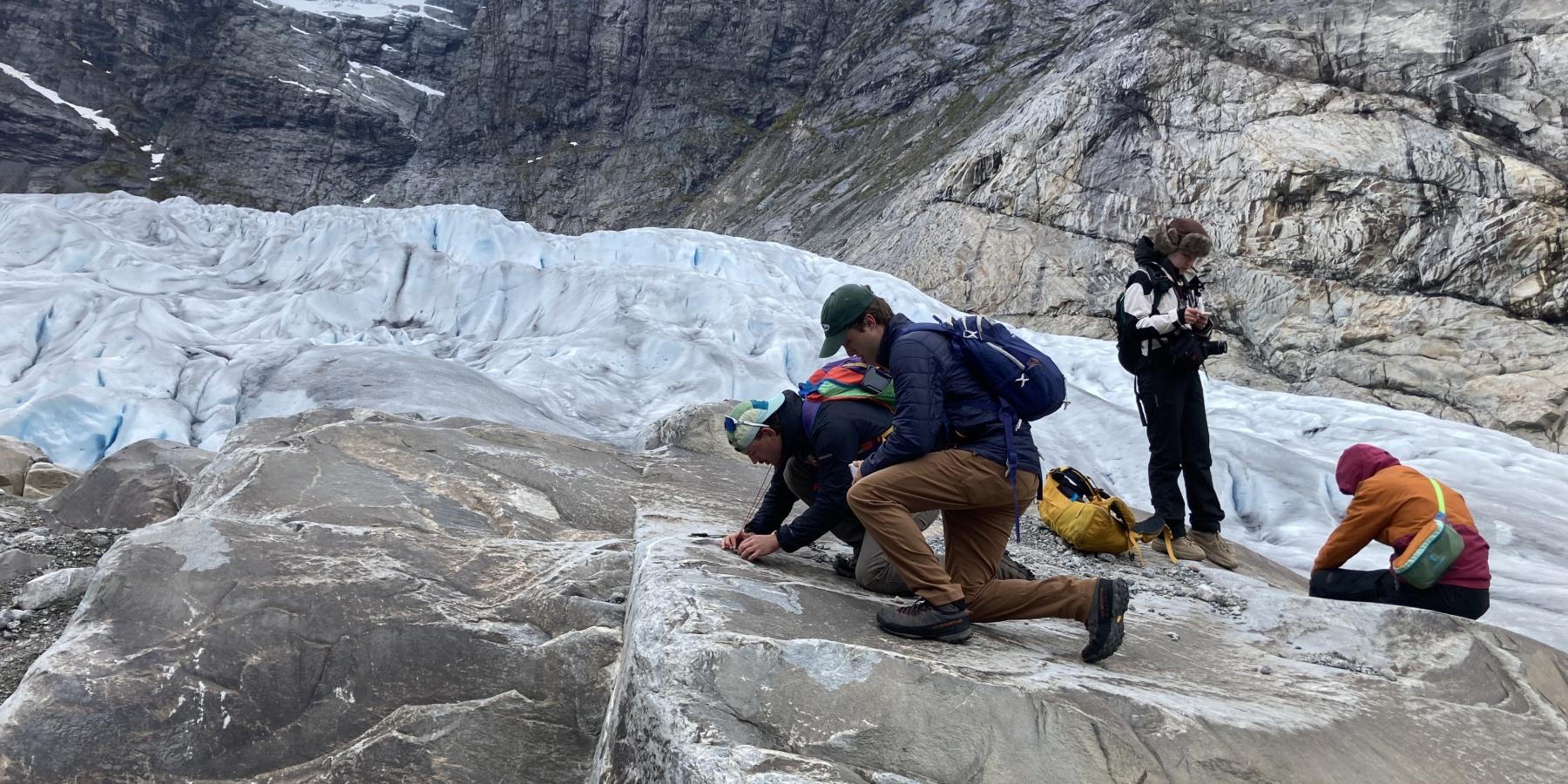 Glacier fieldwork with team of students.