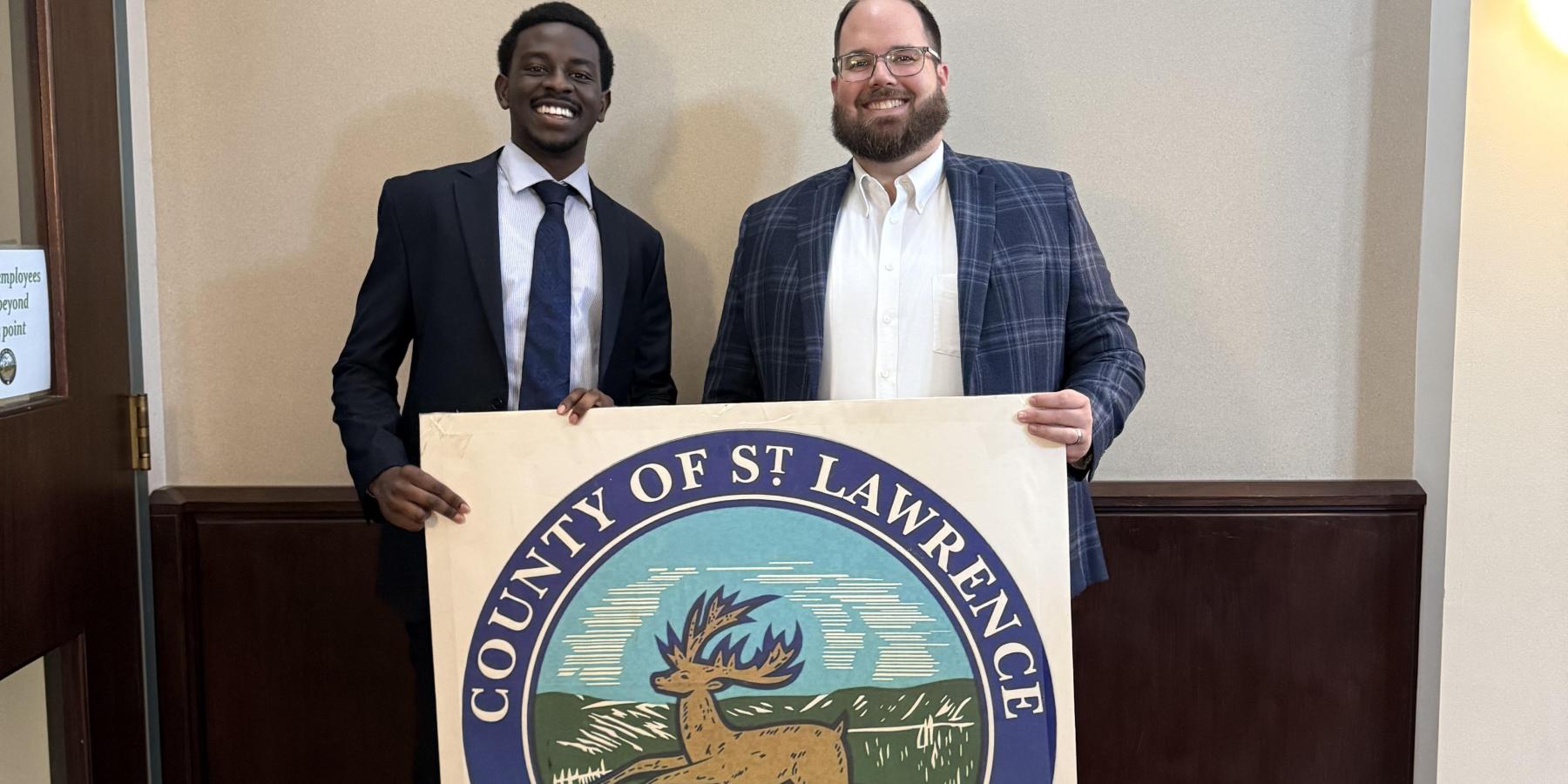 Photo with County Sign