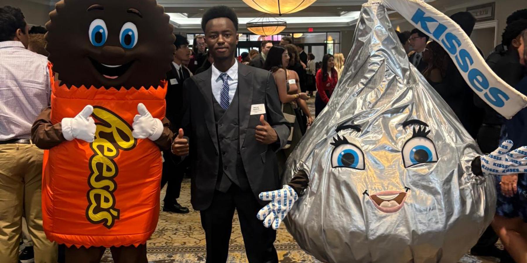 Me with two of Hershey's Mascots Reeses and Kiss