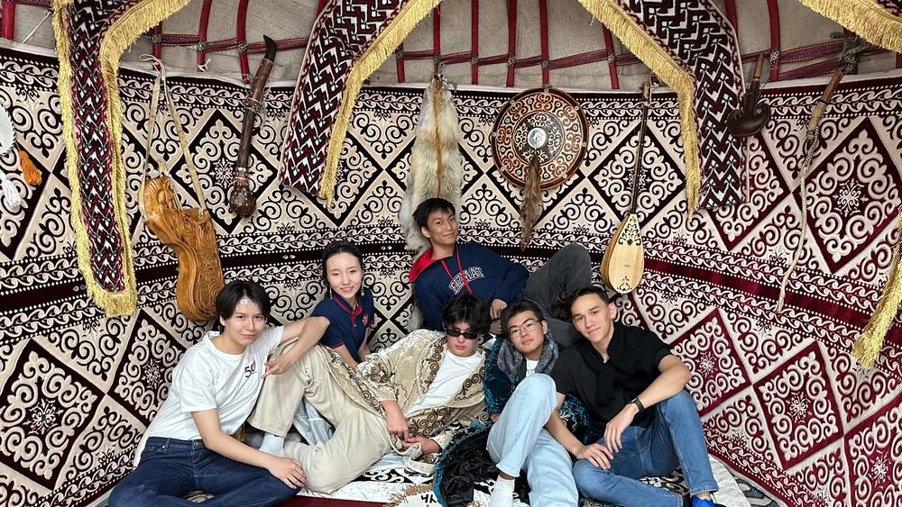 Me sitting with my friends in a yurt on the day of the celebration of Nauruz.