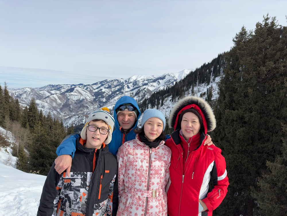Photo of me with my family on one of the hikes in the stunning Mountains of Almaty, Kazakhstan.