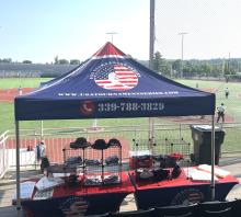 Image of company tent and set-up during tournaments. 