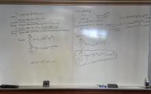 Image of a whiteboard with the student&#039;s math writing.