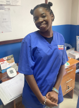 A picture of myself at SHOFCO Mathare clinic, in the antenatal care (ANC) department.