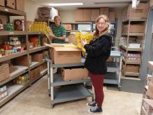 Brianna and Arthur Working in the Pantry