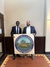 Photo with County Sign