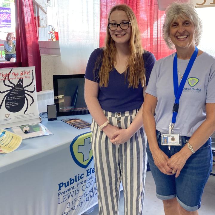 Zoie Lehman (Left) standing and smiling next to Maryann Vargulick (Right)
