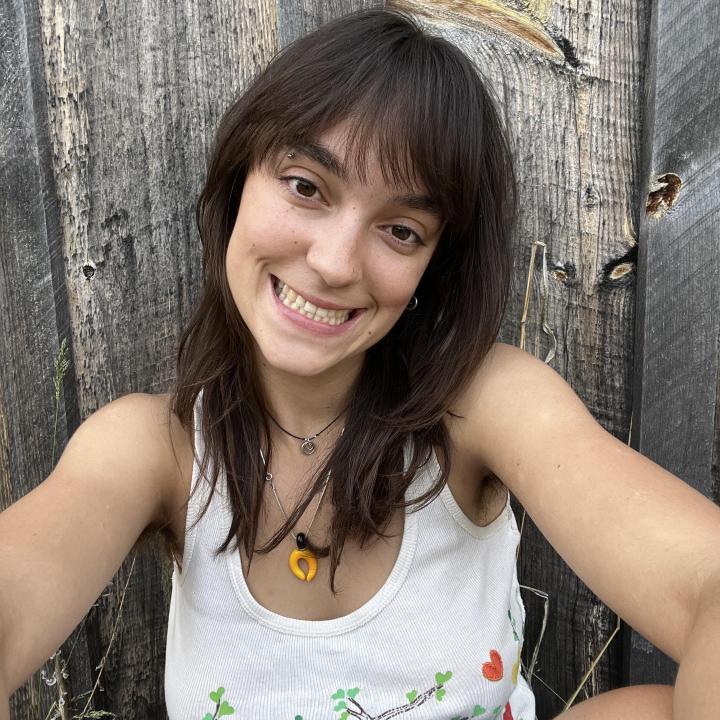 Photo of Kate taken at a Birdsfoot Farm&#039;s off-grid farmer&#039;s cabin