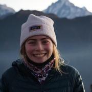 Portrait picture in front of mountain