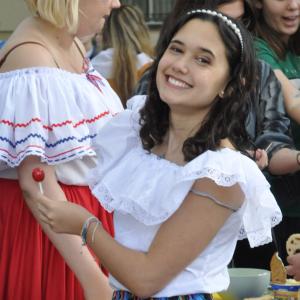 One of my friends took this picture while we were at the &quot;around the world in 90 minutes&quot; event. I was wearing the traditional Venezuelan costume, while giving arepas to all those curious locals who wanted to stop by and try a little bit of my culture. It took place in my previous high school, in Bosnia and Herzegovina. 