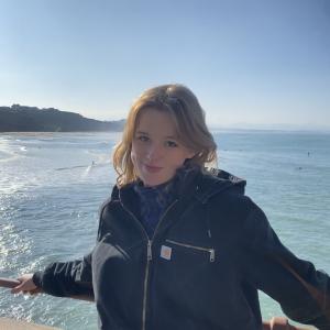 Picture of Catherine beside the ocean in Biarritz.