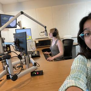 My supervisor, Ana announcing on the air while I entertain 