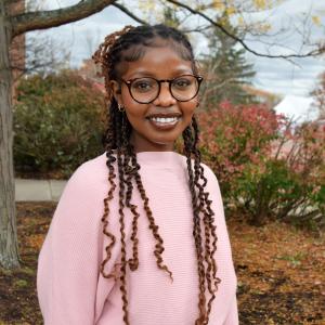 Picture of woman in pink sweater and glasses